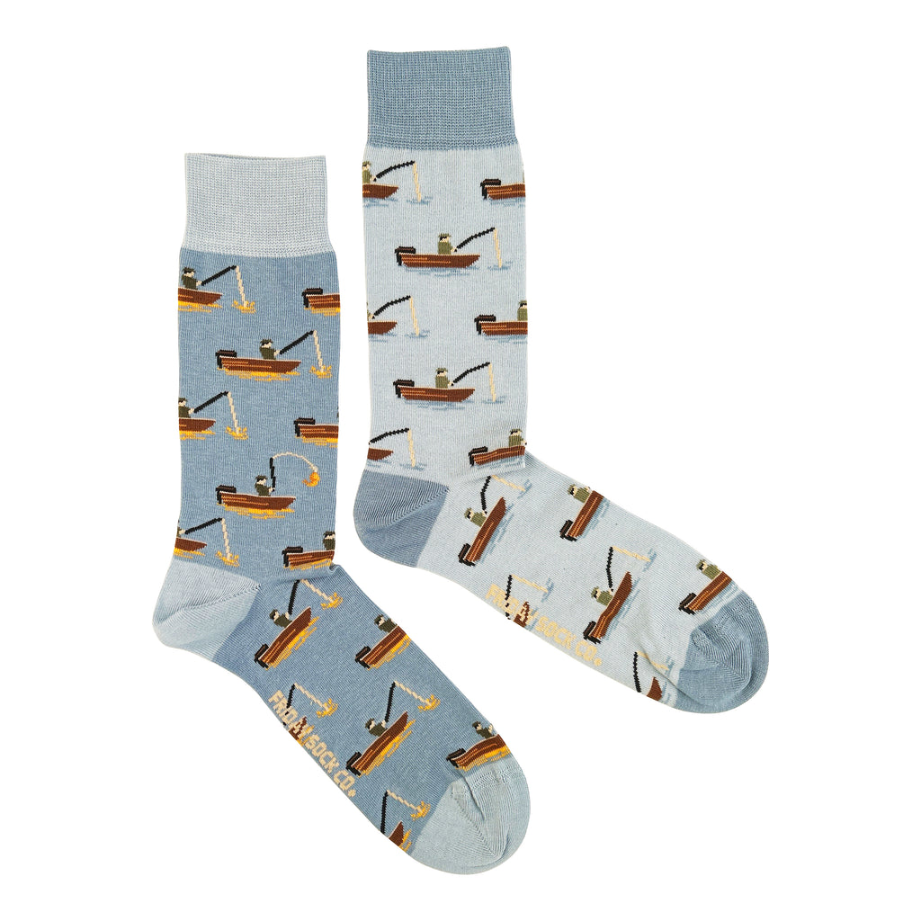 blue multicolored men's socks with fishing boat and fisherman