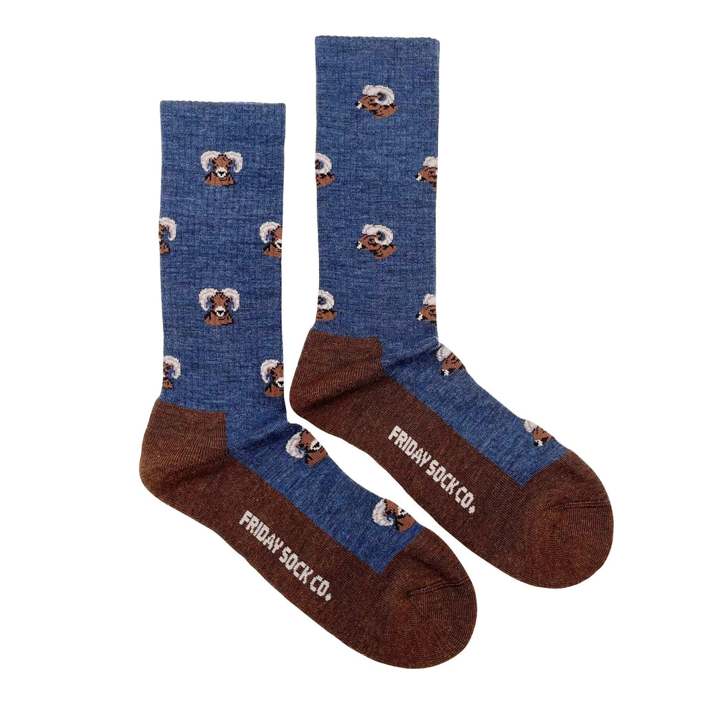 blue socks with a brown sole and big horned sheep design