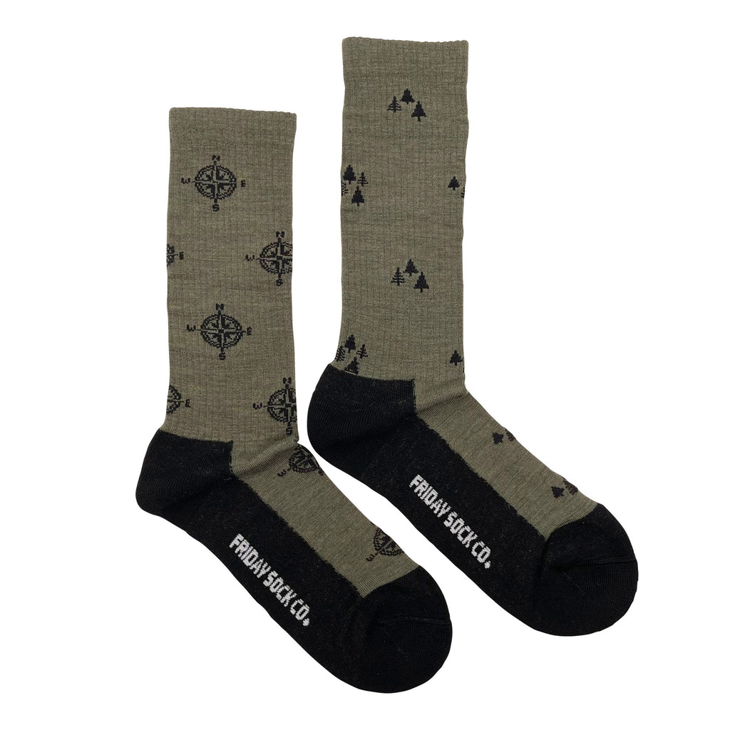 dark wool socks with compasses and pine trees