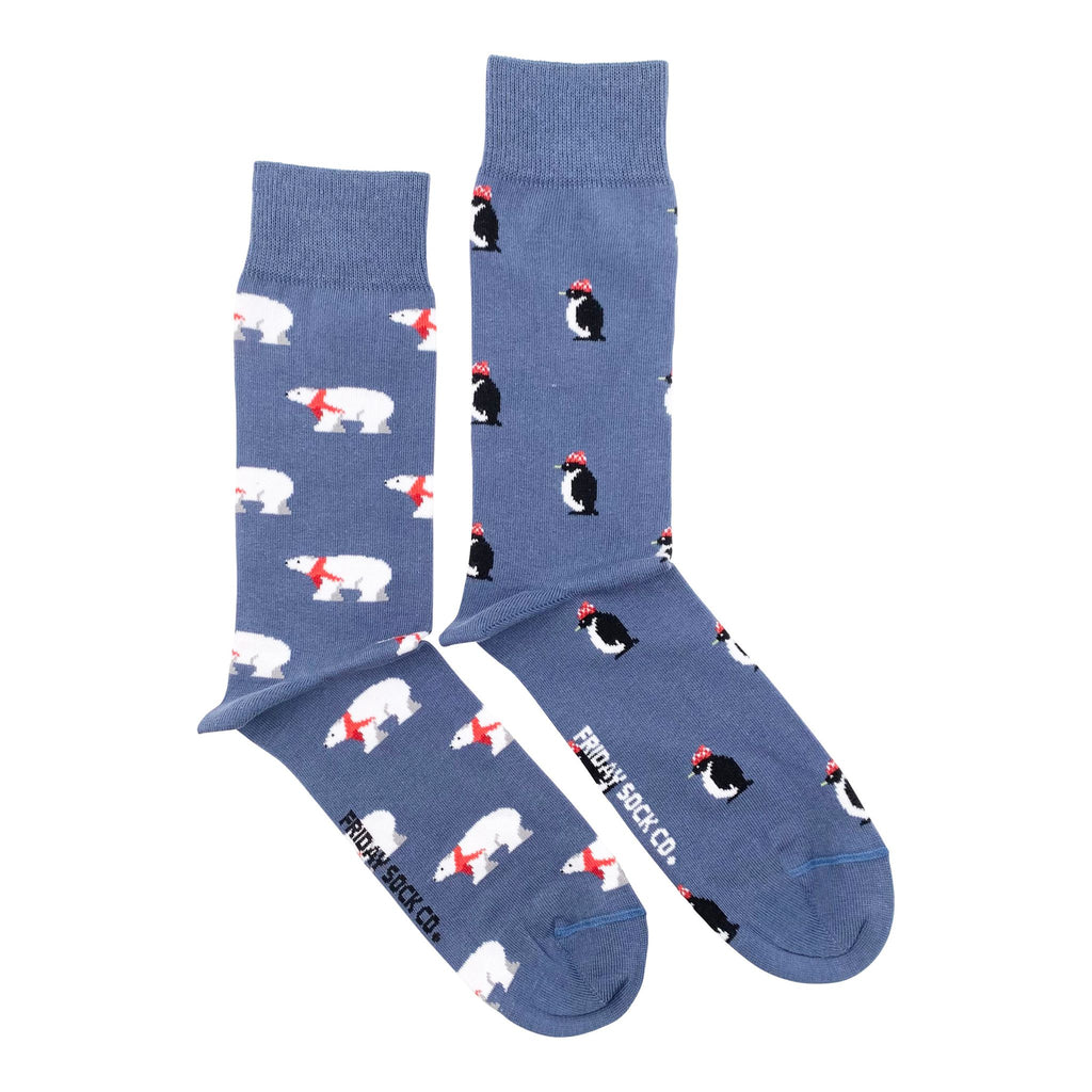 blue holiday socks with festive penguins and polar bears for men