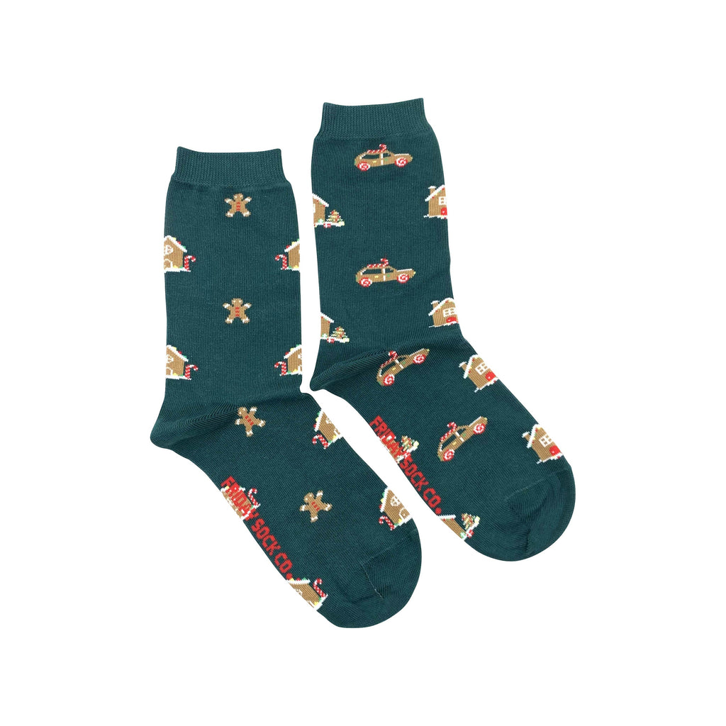 green socks with gingerbreak cookies in the shape of gingerbread man, cars and house
